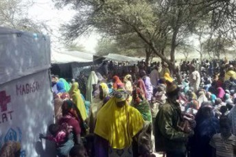 Nigerian refugees wait to be registered by UNHCR in Ngouboua, western Chad.