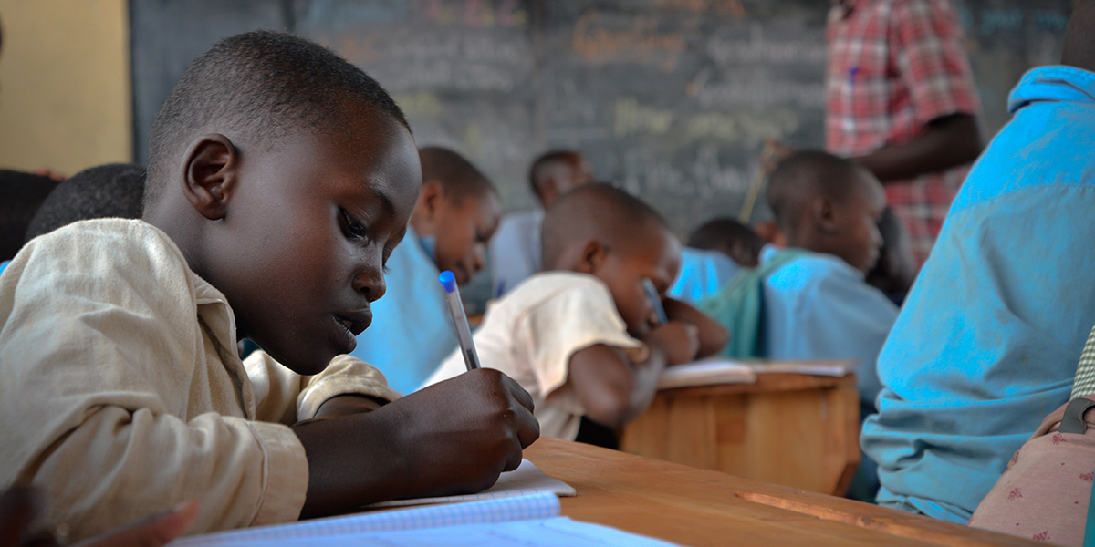 Refugee students paying attention in class