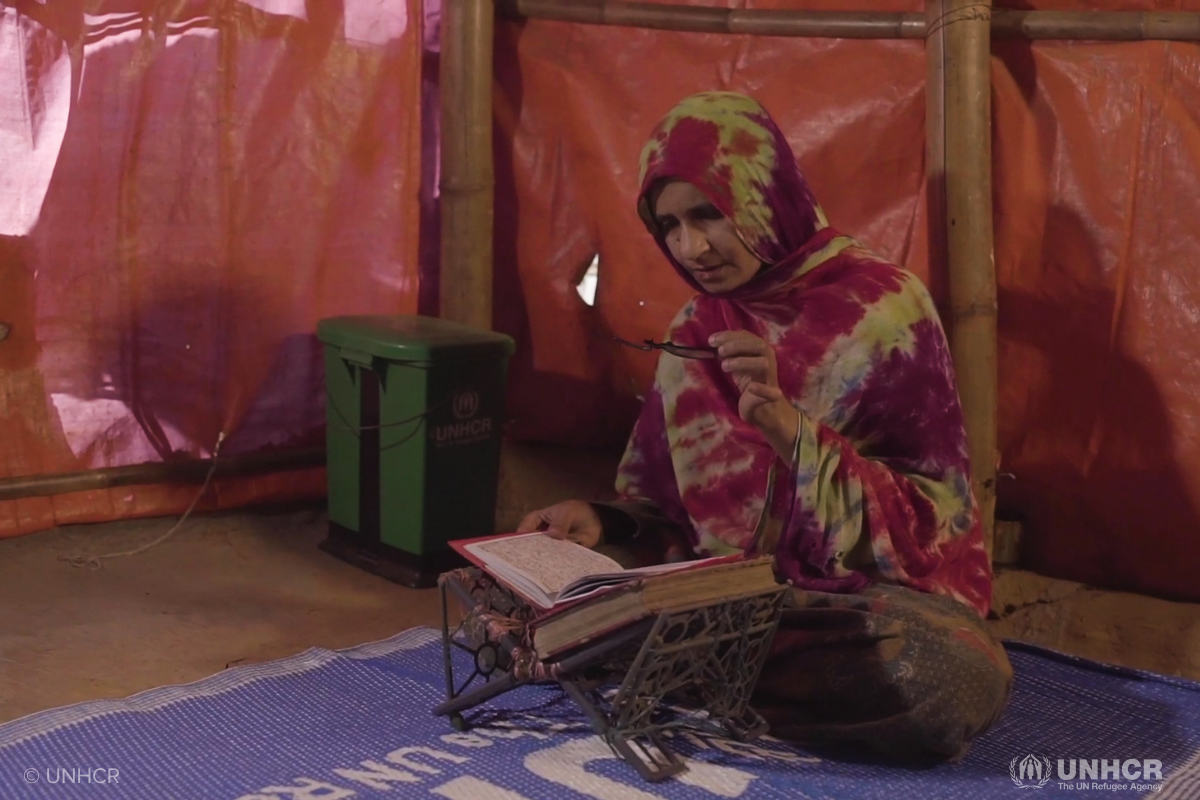 Woman praying in home