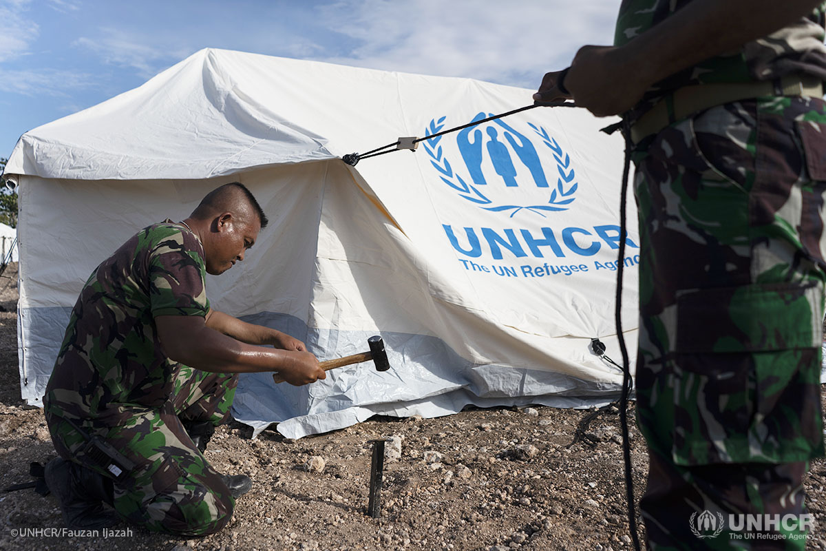 Indonesia army erects UNHCR tents for survivors of earthquake and Tsunami in Donggala, Central Sulawesi, Indonesia.