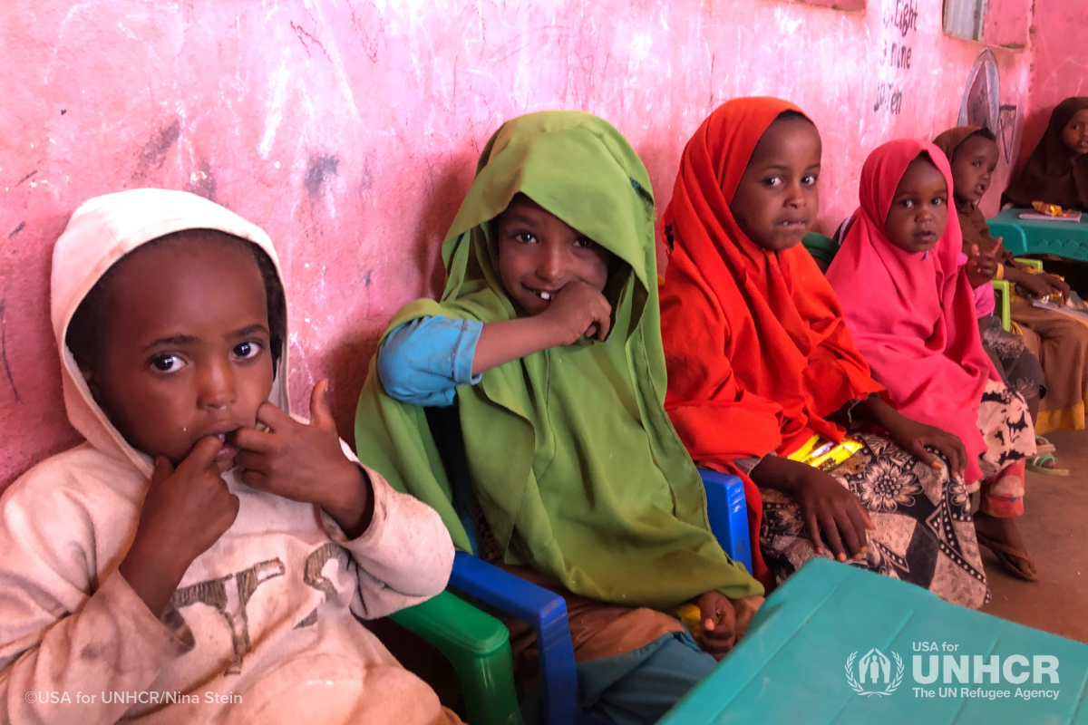 smiling girl in green headscarf in Ethiopia preschool