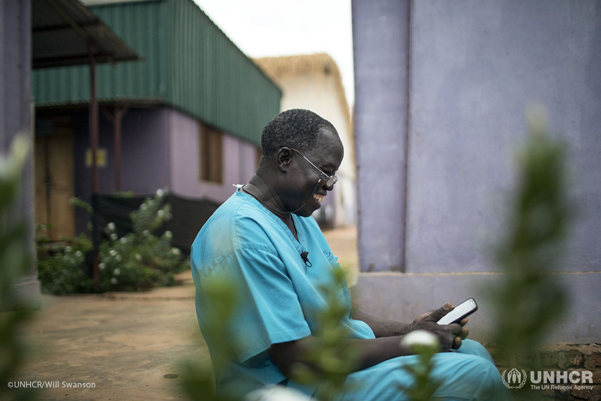 Dr. Atar chats with his wife and children through WhatsApp.