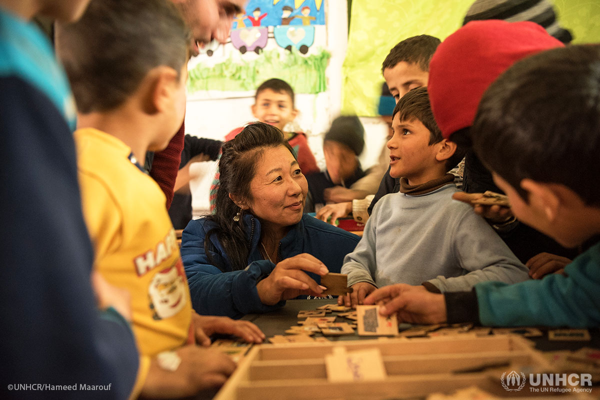 Muhammad tells UNHCR’s Head of Sub-Office in Aleppo, Takashima Yumiko, about the fun activities he does at the UNHCR-supported children’s centre in Dayr Hafer, rural Aleppo.