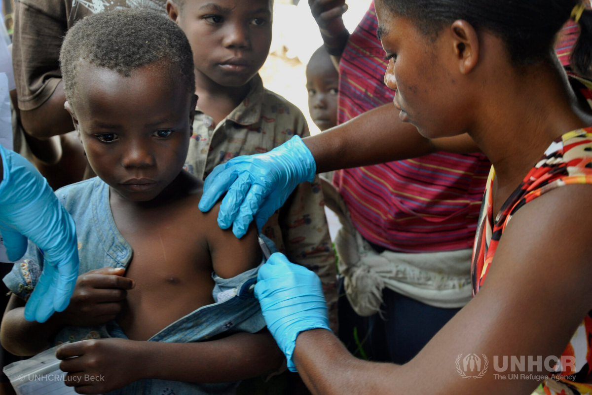 little boy getting a vaccine