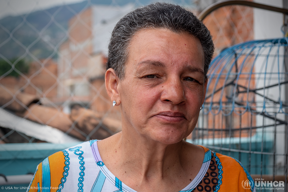 venezuelan cancer survivor looking at camera