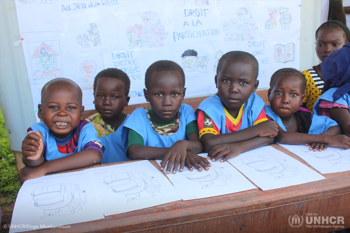 sudanese refugee children use worksheets for class