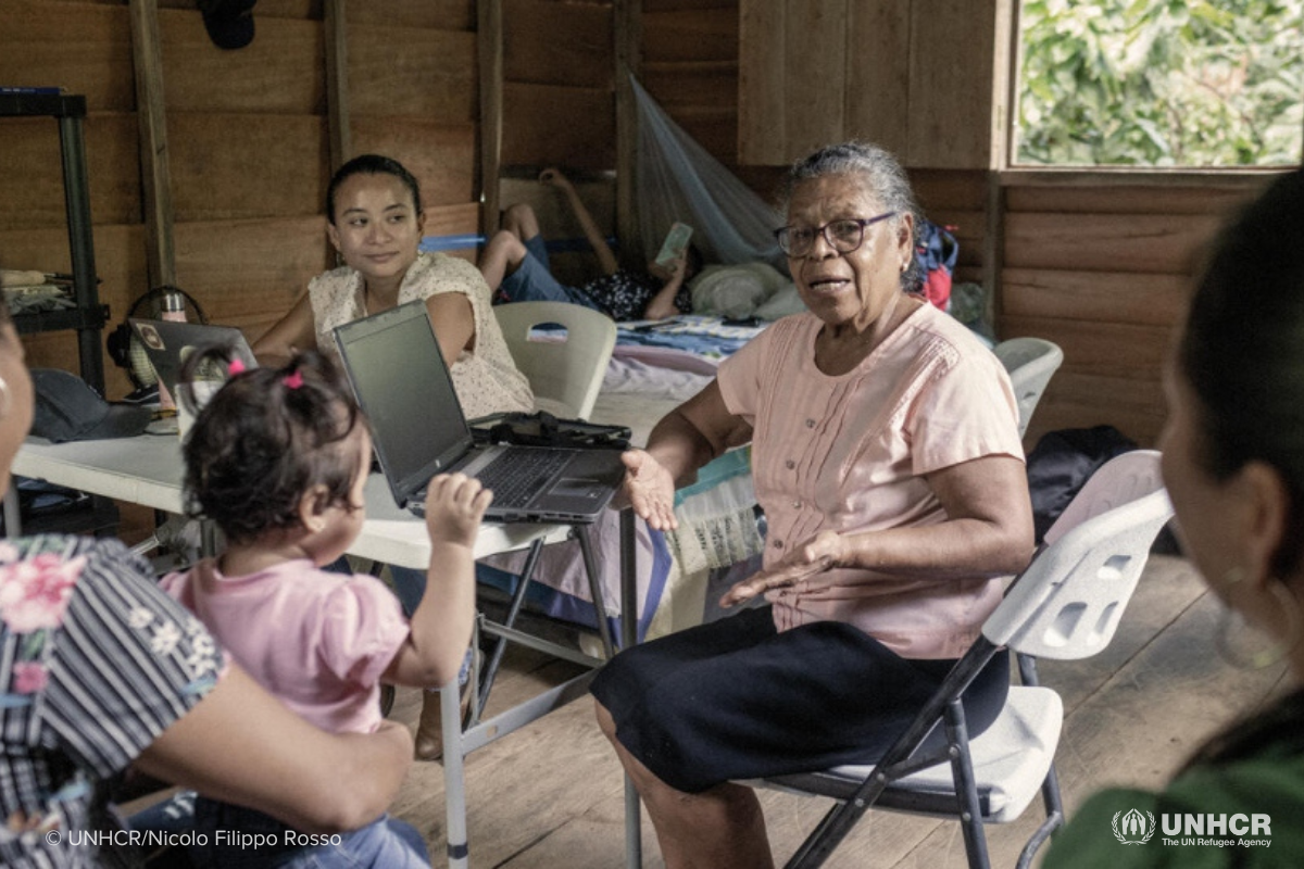 Vicenta (center) and her collaborator Dara Argüello (left) register asylum seeking women from across the nearby border with Nicaragua to help them access basic services.