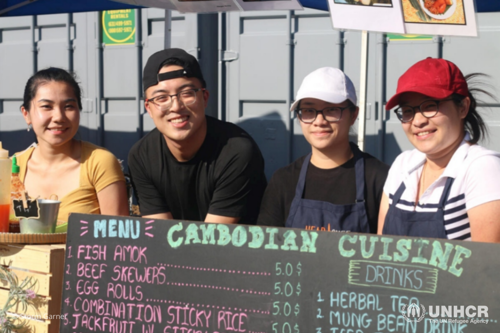 Sokhita Sok (far left) sells fish amok at the Queens Night Market in New York City with her friend Wilson Ng, and her sisters Sandra and Prathna.