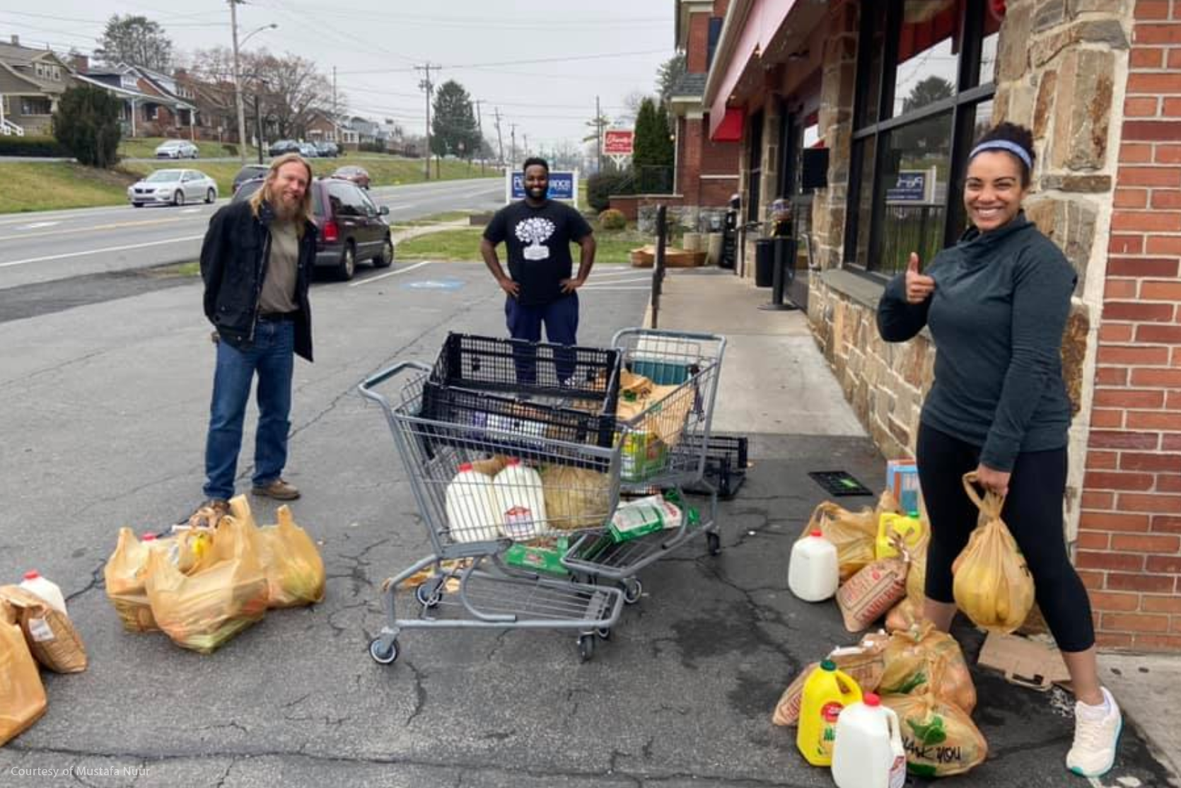 Mustafa volunteering delivering groceries