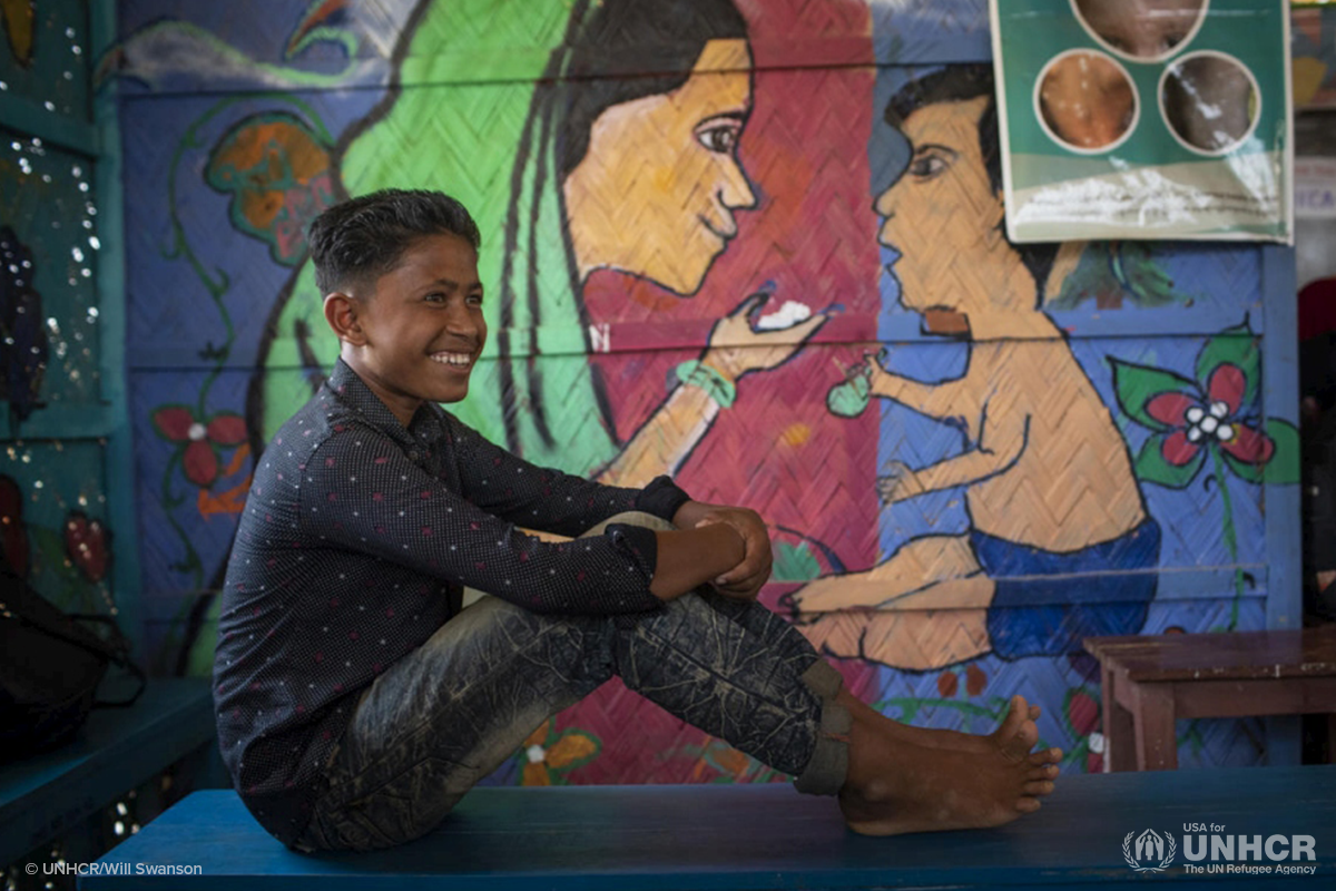 abdul smiles in his classroom