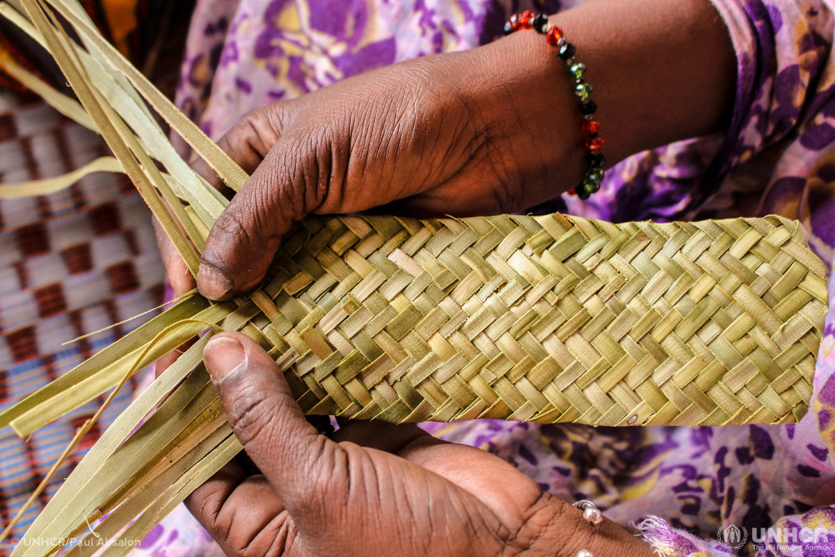 close up image of a person weaving