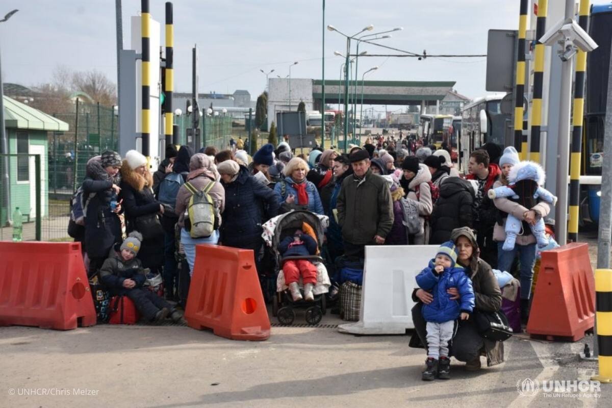 Refugees entering Poland from Ukraine at the Medyka border crossing point.