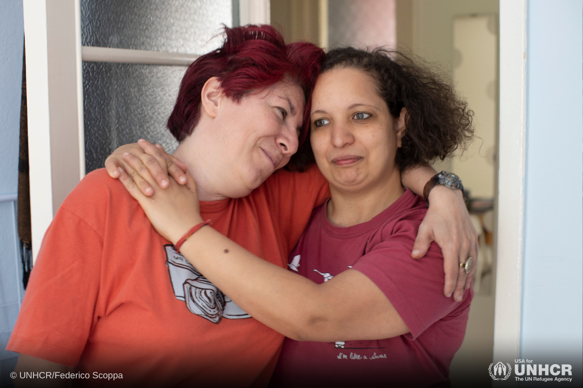 Gay couple, Amani and Maria Teresa, in their apartment in Milan