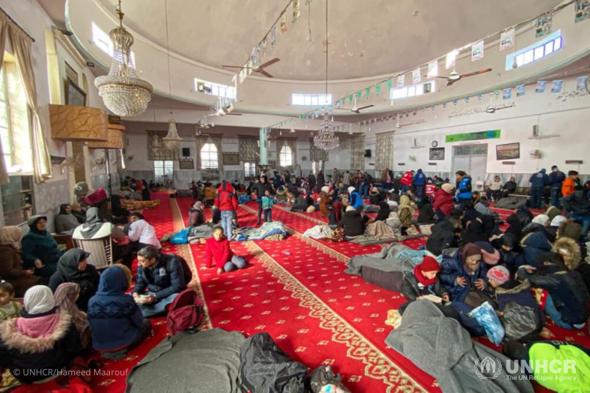 Families shelter inside the mosque in the Suleiman Al-Halabi neighbourhood of Aleppo, Syria.