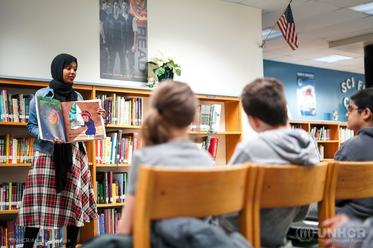 Habso Mohamud reading her book It Only Takes One Yes to children