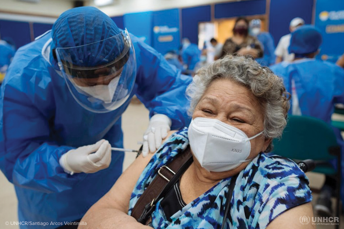 Angela from Venezuela receives her first dose of COVID 19 vaccine in Ecuador