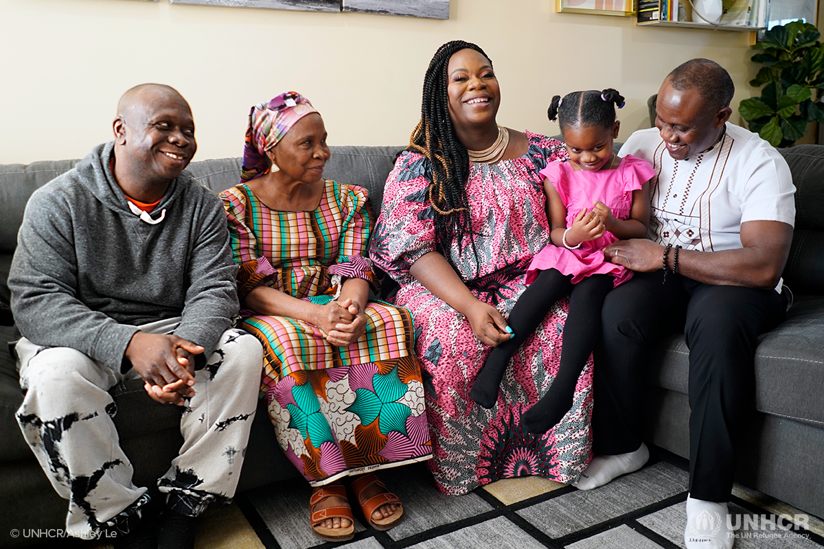 Lourena and her family in their Delaware home