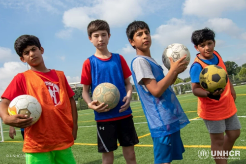 Muhhammed, Ramin, Shaker, and Hafeezullah, during soccer drills 