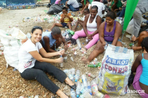 Maha Ganni in Esmeraldas, Ecuador in 2010, working with refugees to help build a library using recycled plastic bottles. 