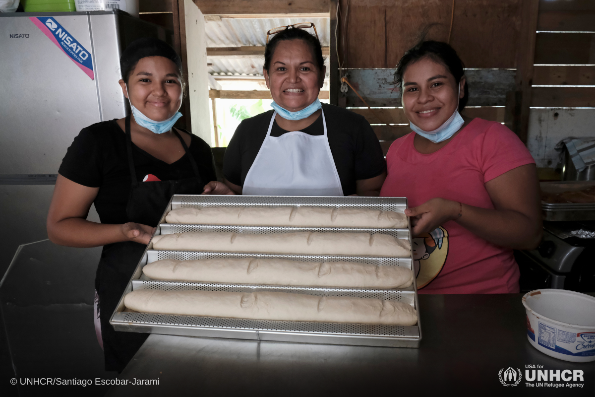 mother and daughters baking together