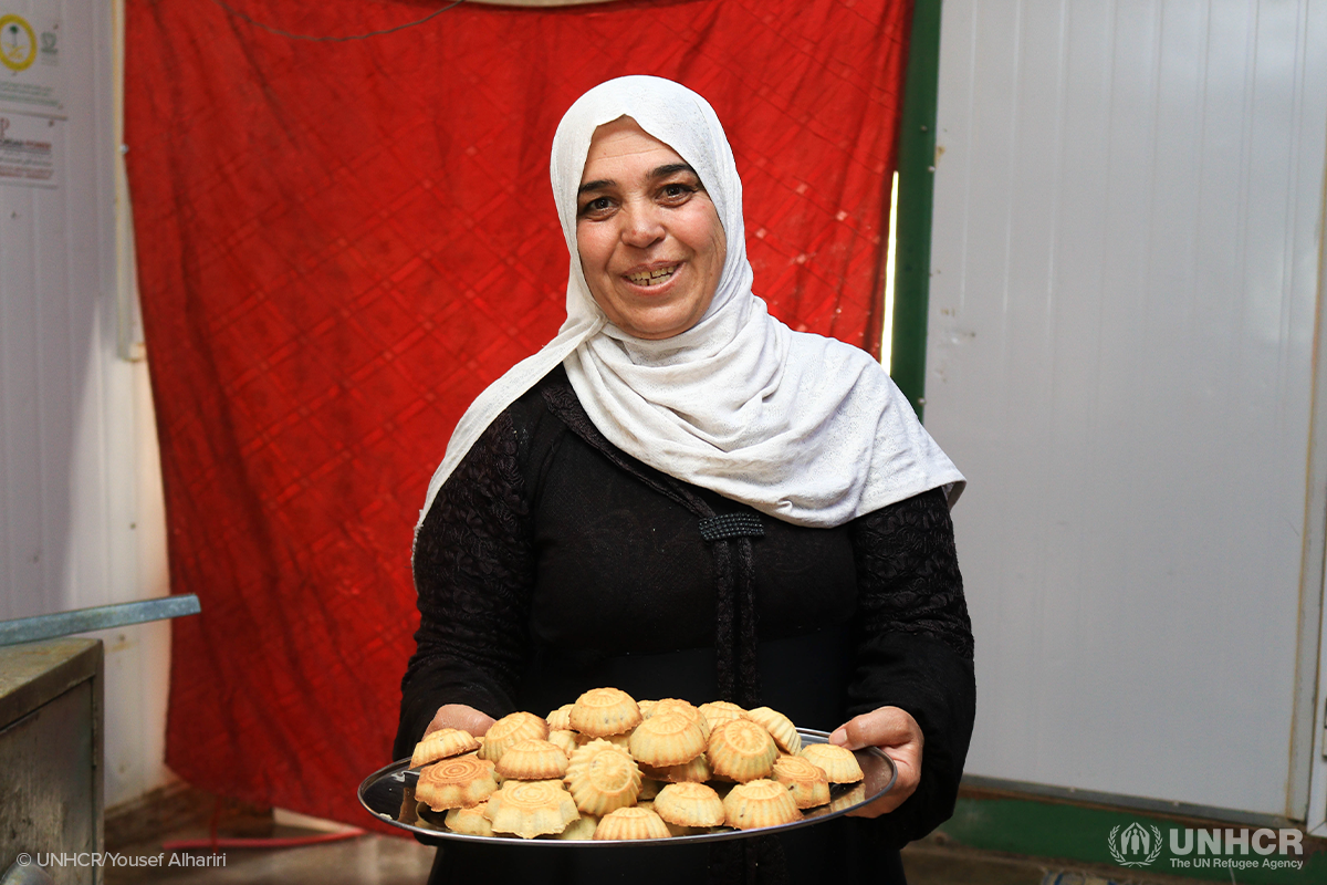 nahla holds a plate of mamoul