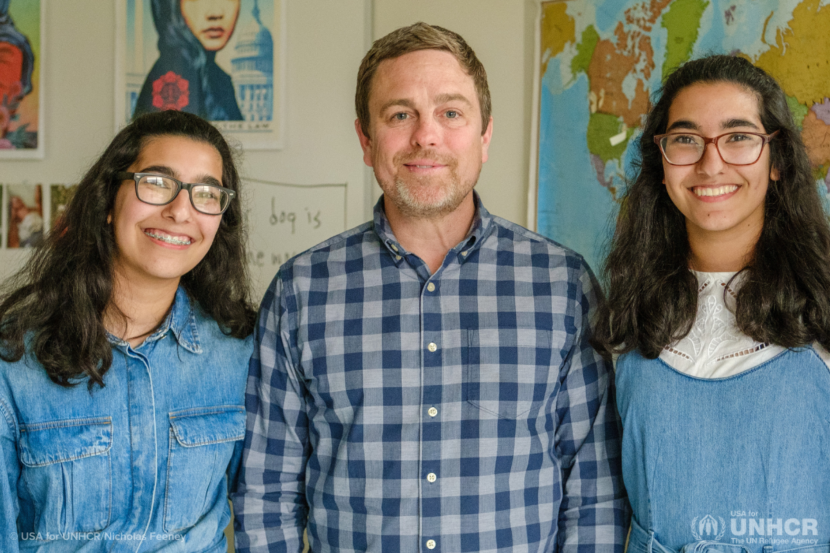 Haya and Ghena and their teacher Damien Johnson