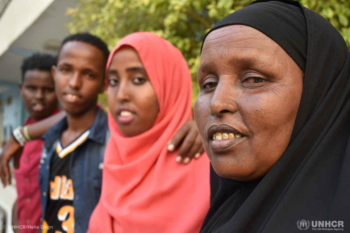 ardo smiles with her children